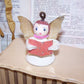 Vintage Made in Japan Christmas angel ornament. Made of mixed materials, she stands 2-1/4" high x 1-7/16".  Very nice condition.  Hang or stand on a mantel.