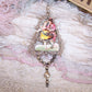 Victorian Revival handcrafted silver tinsel and mercury glass Christmas ornament.  Antique die cut of a dancing couple. Light but lengthy. One of a Kind