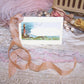 Antique Victorian mixed media gift tag/package decoration. Front of depicts the ocean and lighthouse; sentiment is WITH LOVE AND FOND WISHES.  Reverse is blank.
