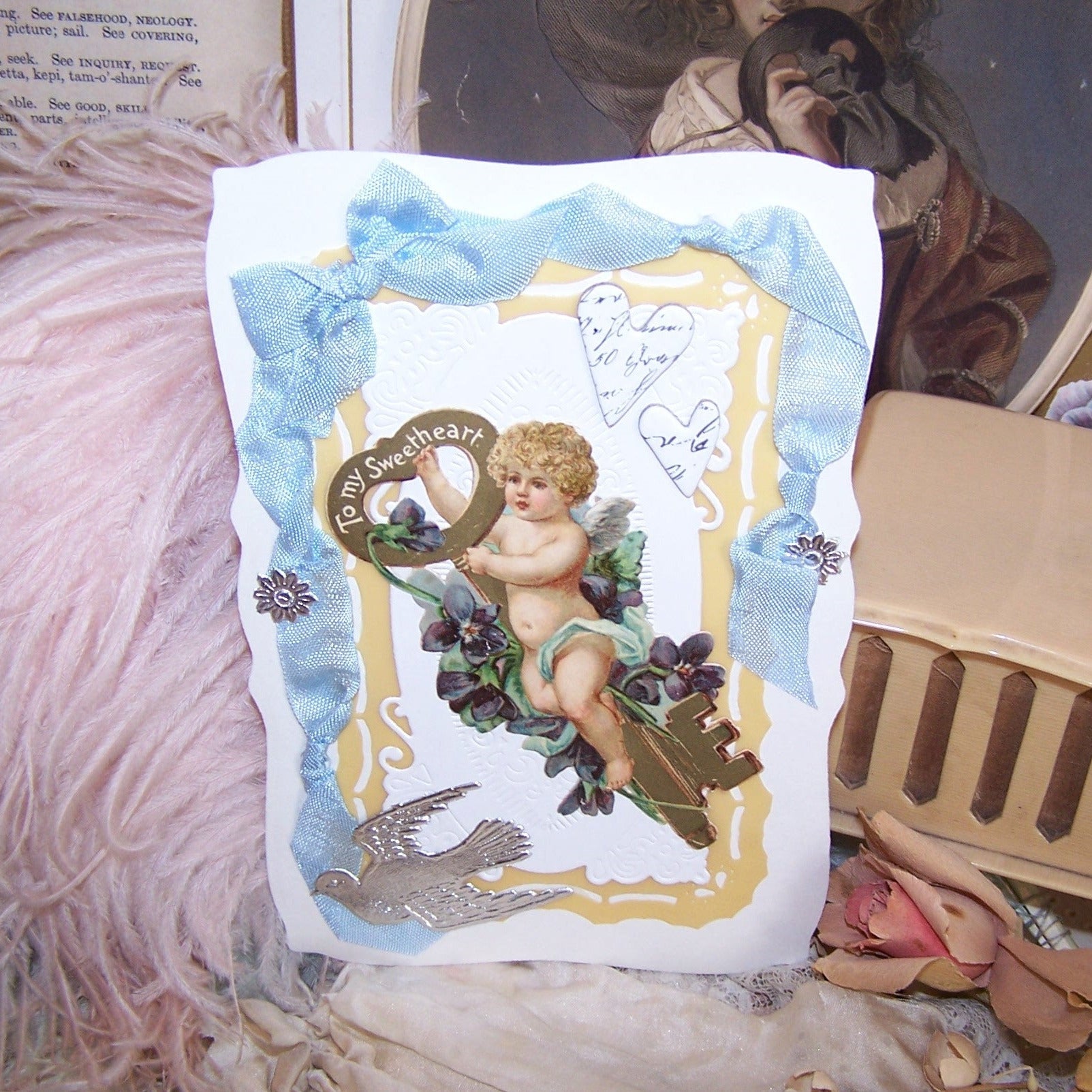 One of a Kind! Mixed media greeting card with cupid - putti - cherub graphics.  Size is just under 6" high x 4". Plain back for writing your own sentiment. 