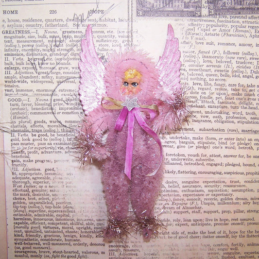 Handcrafted OOAK Pink/Mauve Chenille Guardian Angel.  For Christmas or any day, the little girl has a face of handpainted clay.  5-1/2" x 2-1/2".  Lightweight.