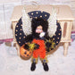 A mixed media ONE OF A KIND "Dark Angel" Halloween ornament . My little girl "trick or treater" carries a Jack O Lantern bucket and is a perfect holiday accent.