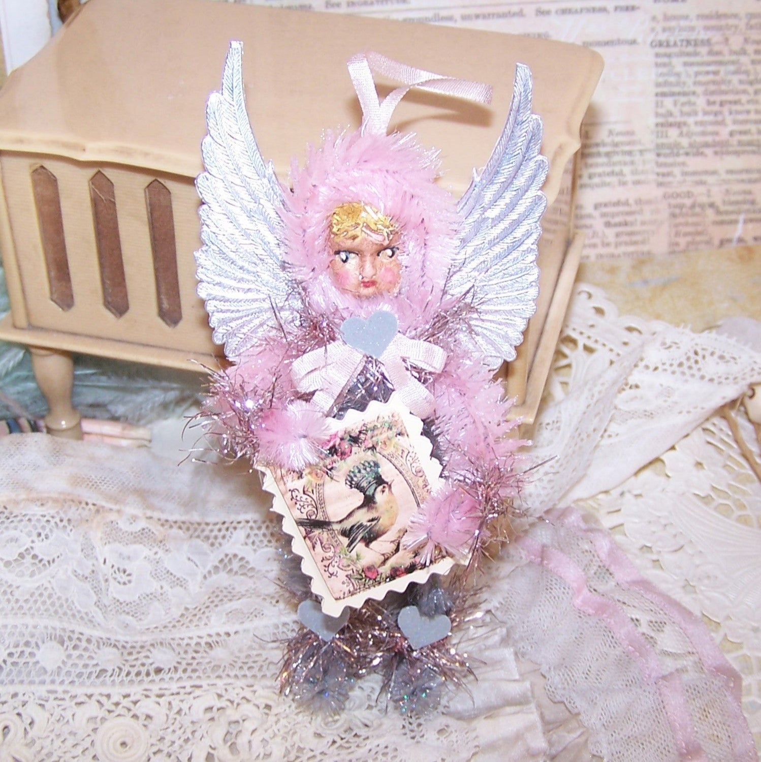 Pretty in Pink! Handmade OOAK Chenille Angel carrying a Blue Bird placard.  For Christmas or any day, the little girl has a face of handpainted clay.  