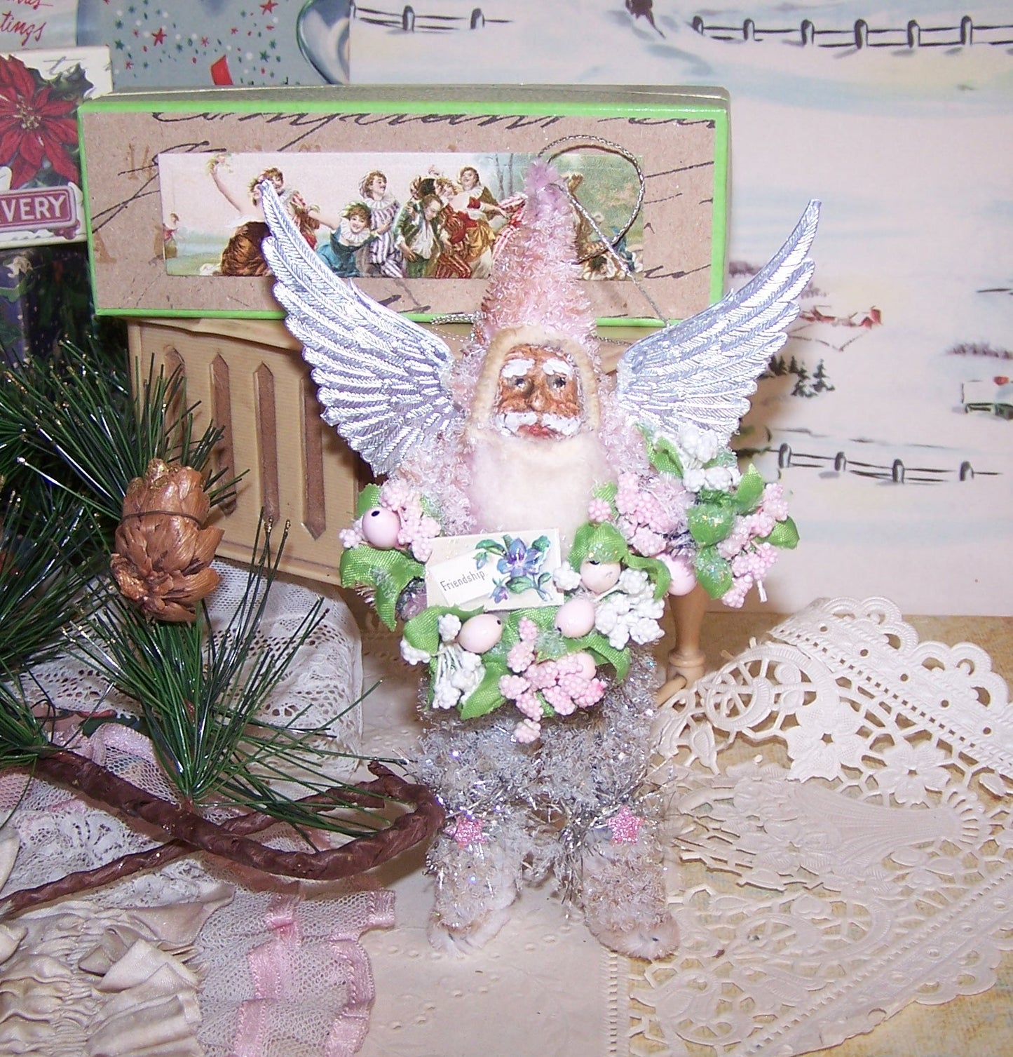 Santa Claus in PINK?  Sure, why not!   Made of Chenille with a handpainted clay face, my Christmas ornament also sports silver wings! 5-1/2" high. OOAK!