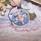 Art Deco unused Christmas Gift package tie on.  Image of an angel riding a rocking horse. Unused condition - vintage patina to the paper. Unknown maker. 