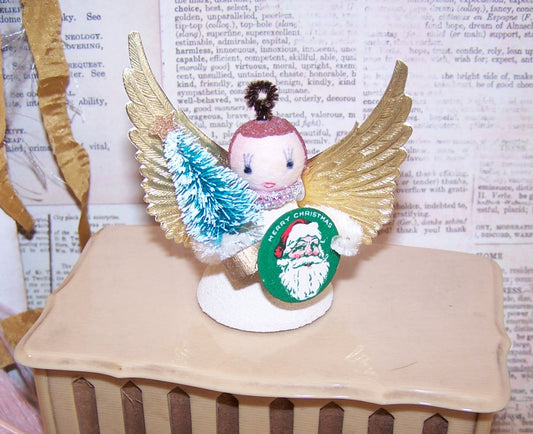 Upcycled Vintage Made in Japan Christmas angel ornament. Made of mixed materials, she stands 2-1/2" x 1-3/8".  Very fine condition.  Hang or stand on a mantel.