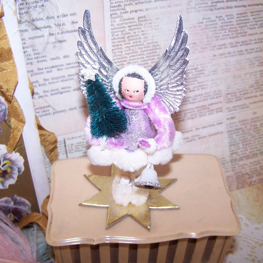 Vintage West German upcycled spun cotton angel ornament.   Off white/orchid coloring.  Silver wings and gold base.  5" high x 2-1/2" wide. Mantel decoration.