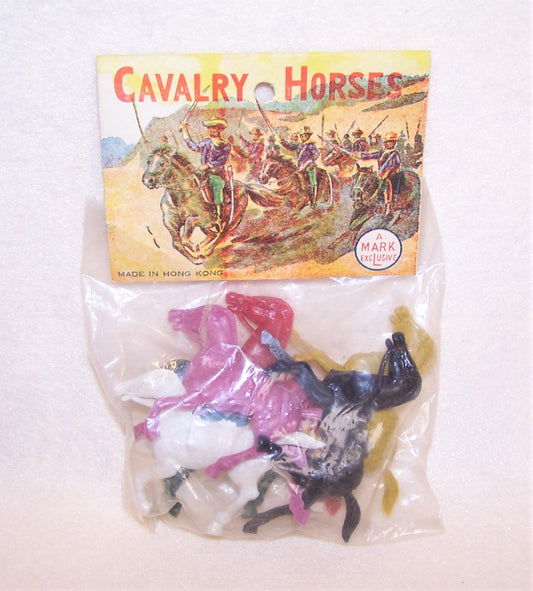 Vintage 50s Made in Hong Kong unopened package of plastic US cavalry horses - A Mark Exclusive. Colorful display header of U.S. Soldiers. Very nice condition.