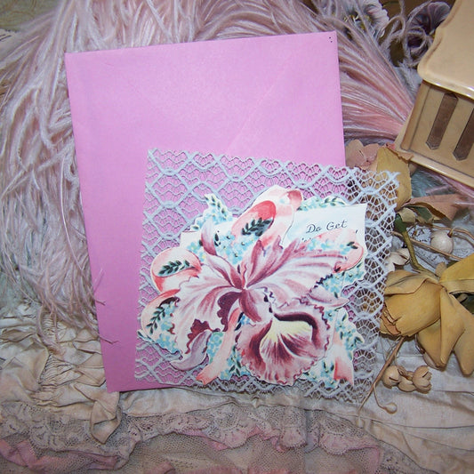 Colorful 1950s greeting card asking the recipient to "DO GET WELL SOON." Orchid graphics.  Paper card over stiffened lace back.  Comes with envelope. 