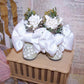 Vintage decorated doll shoe ornament, gift or table favor. Buff with bridal white and green accents - satin ribbon, lace and paper flowers. 3-1/2" x 4". 